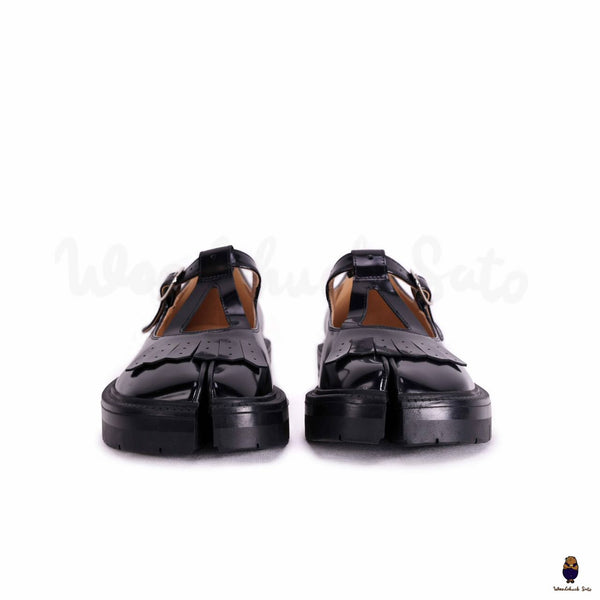 WoodchuckSato Tabi black split-toe mary janes with chunky cleated sole