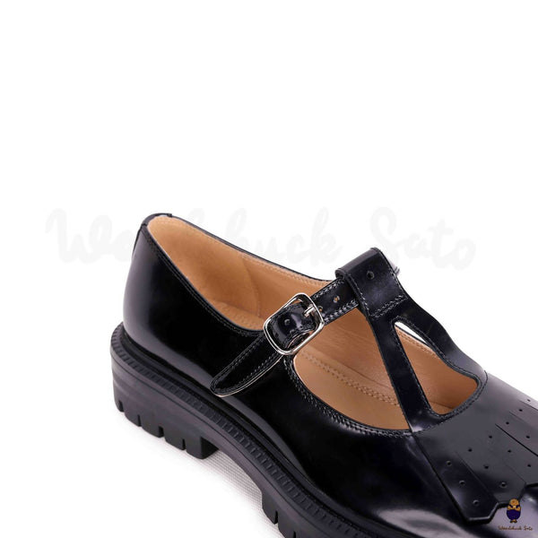 WoodchuckSato Tabi black split-toe mary janes with chunky cleated sole