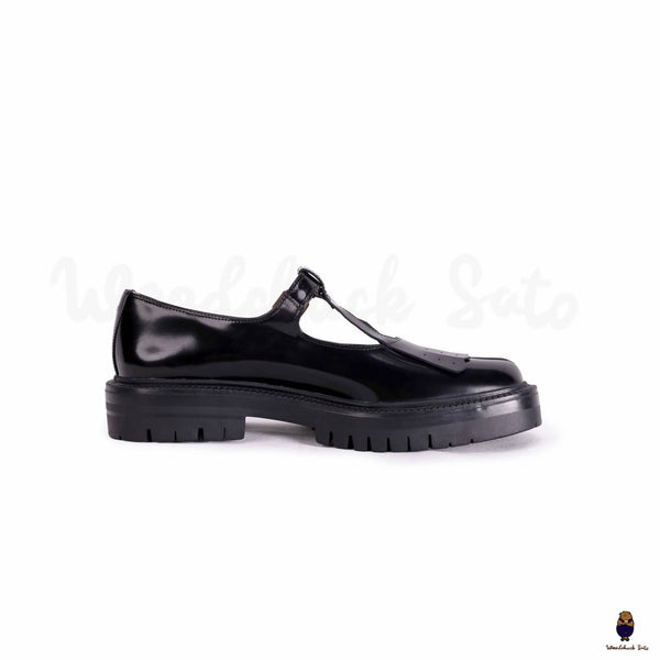 WoodchuckSato Tabi black split-toe mary janes with chunky cleated sole